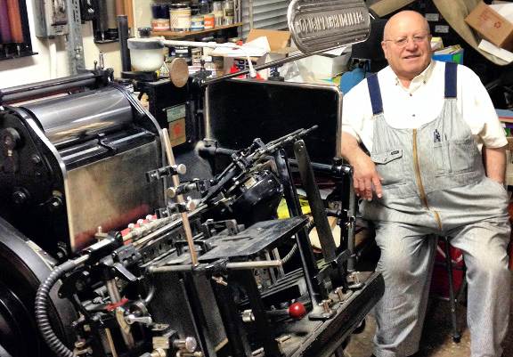 HCA- Heritage Happenings- Fall-2014 Ambrosi Printers shop Dad sitting