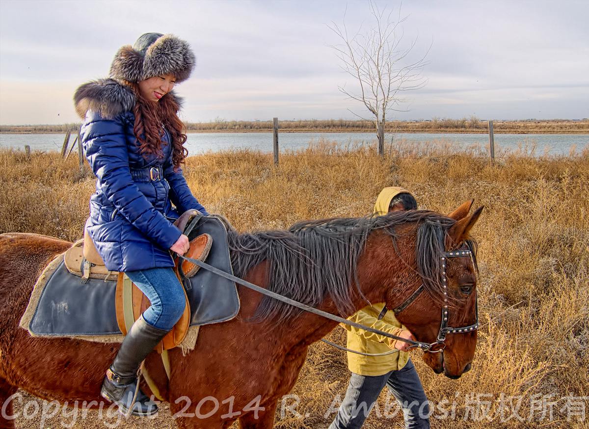 Assiya, riding for the first time, was led off by her coach to begin the afternoon's ride.